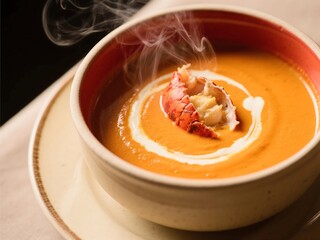 Lobster Bisque. A rich and velvety French soup made with lobster shells, cream, and Cognac