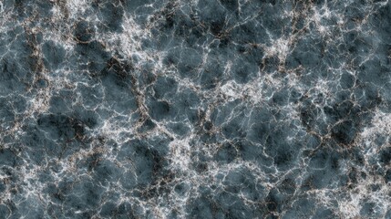 Obraz premium Abstract blue marble texture with white veins and dark areas resembling a stone surface