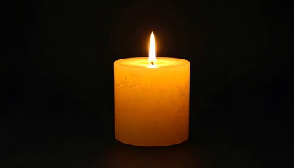 Single candle flame against black background