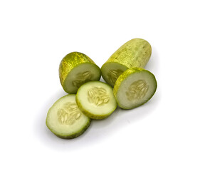 Sliced fresh cucumbers on white background, perfect for healthy eating, vegan recipes, food blogs, detox diet, kitchen ingredients, organic vegetables, and minimal food photography. High resolution.