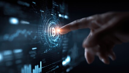 A hand touches a glowing bitcoin symbol on a digital interface.  Data visualizations and charts overlay the screen.  Dark background emphasizes the glowing interface elements