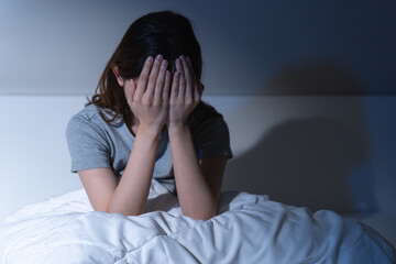 Sad worried and stressed, depressed asian young woman, girl suffering in bed from insomnia problem,...