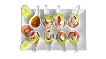 Raw shrimp with spicy fish sauce on spoons