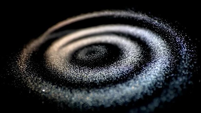 Mesmerizing footage of tiny ling particles swirling and cascading like a celestial snowstorm.