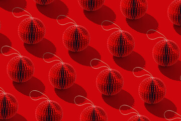 Paper Christmas Ornaments, hanging red New Year decorations as round balls. Minimal aesthetic...
