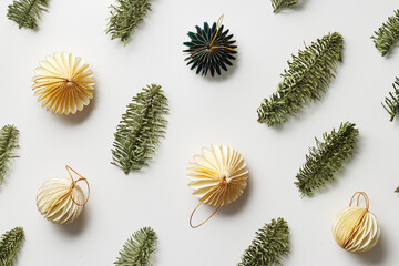 Minimal winter holidays top view composition with New Year paper festive ornaments cream beige...