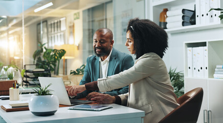 Laptop, business people and team planning in office for insurance, meeting or idea at night. Computer, collaboration and happy African workers with feedback, solution and help with policy on overtime