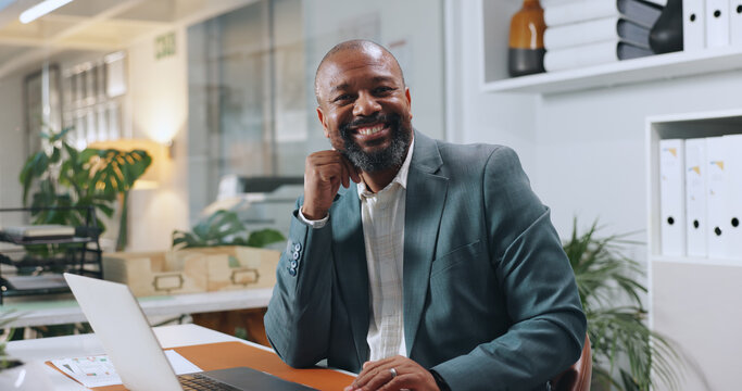 Smile, laptop and portrait of business black man in office for risk assessment, policy review or planning. File claim, insurance application and digital underwriter with person for inspection report