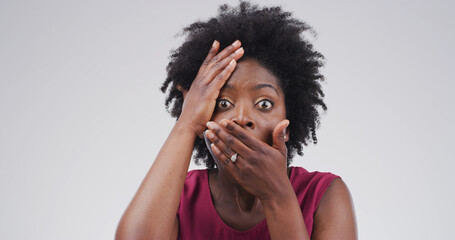 Portrait, surprise and black woman in studio, horror and announcement on white background. Person,...