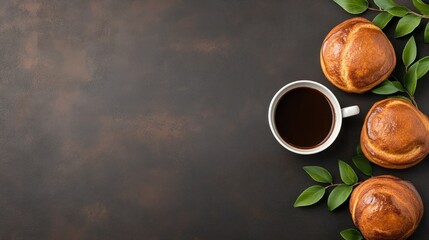 Coffee and pastries on dark surface
