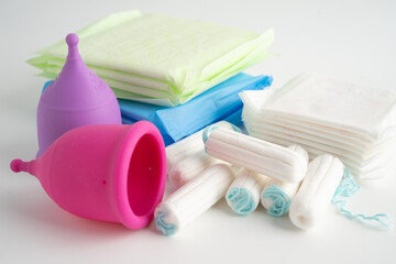 Menstruation cycle with sanitary pad and cotton tampon for woman hygiene and protection.
