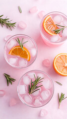 Pink Lemonade Refreshment A Trio of Citrus Rosemary Infusion in Clear Glasses on a Pink Backdrop