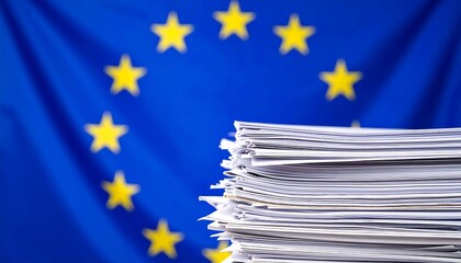 Stack of documents against a European Union flag