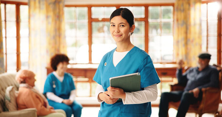 Fototapeta premium Woman, caregiver and portrait with tablet in nursing home for schedule, rehabilitation agenda and healthcare. Smile, nurse and medical professional with tech for digital support in elderly care