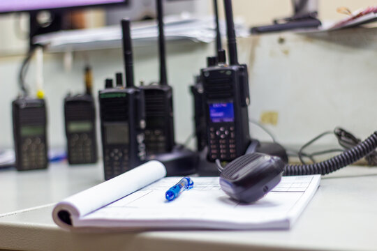Two-Way Radios and Communication Gear on a Desk