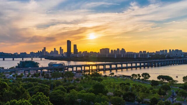 Zoom in Sunset at Han River and the Rainbow Fountain at Banpo Bridge at night with beautiful lights. Romantic tourist attractions in Seoul,