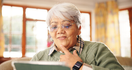Thinking, old woman and watching movie with tablet, streaming and relax in home with website or app. Happy, senior person and entertainment with tech in house, reflection or online for film in lounge