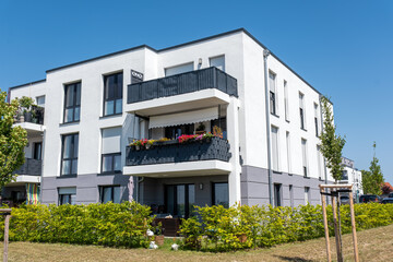 Fototapeta premium White multi-family residential building seen in Germany