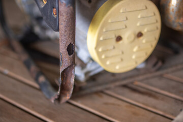 rust on the metal frame of an electric generator