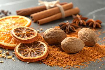 Macro shot of nutmeg and dried orange peels in detailed studio lighting