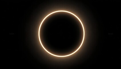 Glowing golden circle on black background