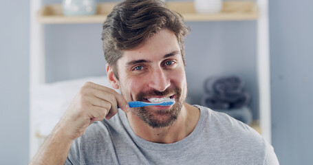 Happy man, portrait or brushing with toothbrush for dental care, hygiene or oral health in...