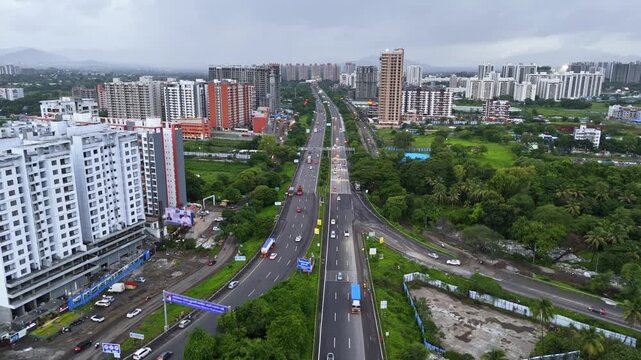 Aerial View City Highways Cutting by Towers and Parks