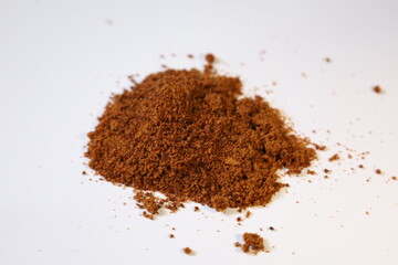 Scattered piles of brown sugar