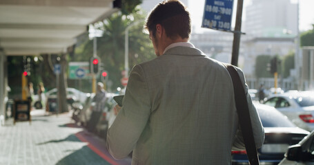 City, walking and back of businessman with phone on morning commute for news, email and online....