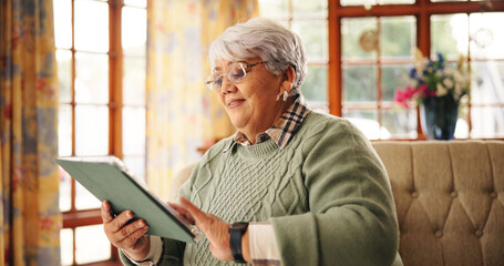 Streaming, series and senior woman with tablet, living room or watching movie on web and...