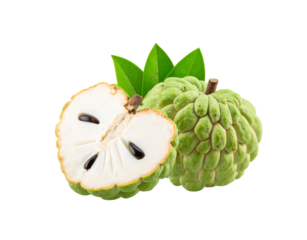 A whole and a halved custard apple with green lumpy skin creamy white pulp black seeds and fresh leaves.