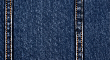 Close-up of blue denim fabric with vertical seams on the left and right sides.