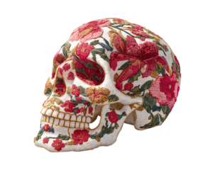 Hand-embroidered skull with floral patterns isolated on a transparent background