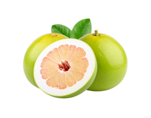 Ripe green pomelo citrus fruits one cut in half revealing pink flesh with leaves.