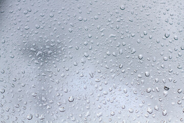 water droplets on a glass on a light gray background