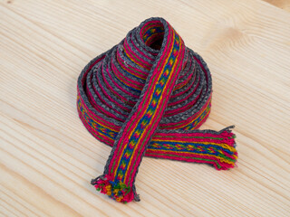 Woven woolen Latvian folk costume belt. Ethnic motifs of the Latgale region. Travel through the Baltic States. Song and Dance Festival