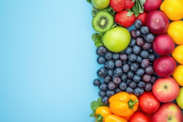 Vibrant assortment of fresh fruits and vegetables artfully arranged along the right edge of a serene light blue background, creating a visually appealing composition.