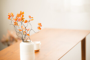 Yellow leafy branches on the table Autumn image