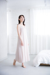 Whole body of a fresh woman in a one-piece loungewear Lifestyle