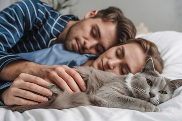 Cat lying in bed with sleeping couple, close-up of fur and hands. Symbol of pet-human bond, comfort, and love in everyday life.
