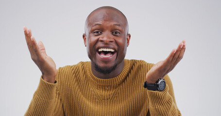 Surprise, happy and portrait of black man in studio for lottery winner, announcement and prize...