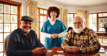 Portrait, nurse and playing cards with senior men for contest, friendly competition and hobby....
