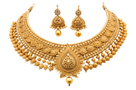 A meticulously detailed, ornate gold necklace and matching earrings are displayed against a stark white background