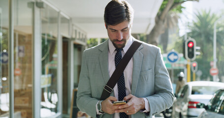 Businessman, phone and chatting in city for travel, commute or communication on sidewalk. Man,...