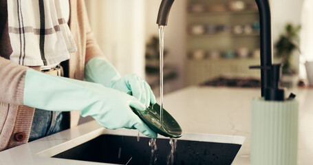 Cleaning, water and hands of person in kitchen for washing dishes, hygiene and prevent bacteria....