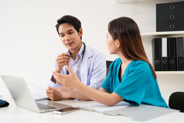 Doctors, nurse work with  laptop in healthcare, planning research or surgery teamwork in wellness...