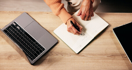 Hands, above and writing on notebook in home for reminder, agenda or planning with ideas. Journal, laptop and mature person with diary for checklist, tasks and schedule with to do list for notes
