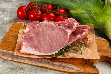 Raw pork steak loin with bone