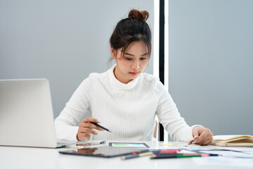 UI and UX designs for mobile app on laptop computer screen. User interface development planning for...