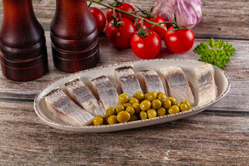 Slided marinated salted herring fillet